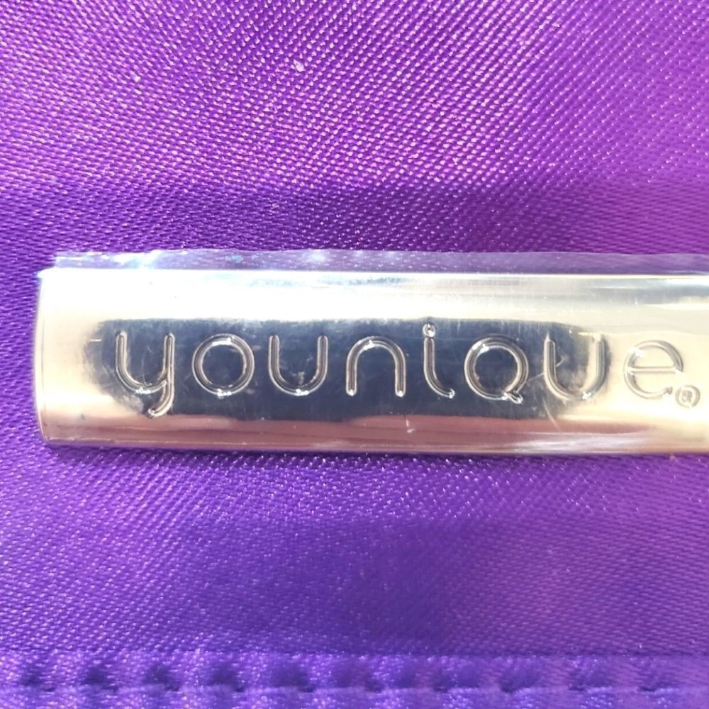 Younique purple clutch  
